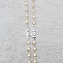 Load image into Gallery viewer, Our Lady of Fatima Rosary with Cream Oval Beads, Medallion, and Case