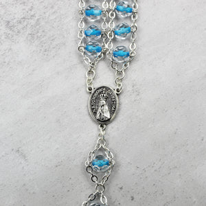Our Lady of Fatima Rosary with Clear & Blue Beads, Medallion, and Case
