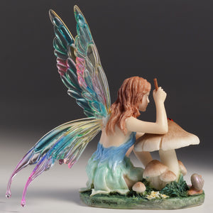Fairy Figurine Painting Ladybug on Mushroom – Colorful Winged Fairy Statue with Nature Accents